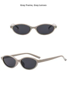 Detail view of oval retro taupe sunglasses with dark gray lenses and stylish narrow frame