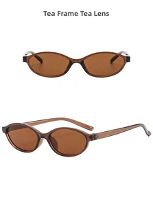 Detail view of oval retro brown sunglasses with translucent frames and tea lenses