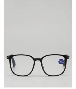 Detail of +2.50 blue light blocking reading glasses with large black frames and labels