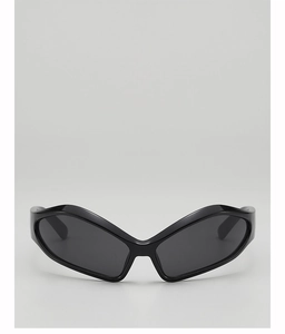 Close-up of avant-garde black butterfly wing kids sunglasses with high-gloss finish