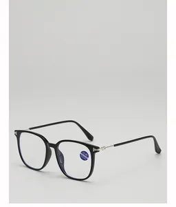 Detail of +2.50 blue light blocking glasses with black frame and metal temples