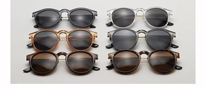 Draufsicht auf Vintage-Rundsonnenbrillen-Set in sechs Farben mit goldenen Stegdetails
