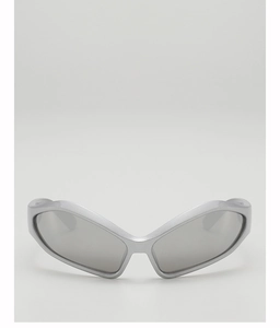 Close-up of futuristic silver kids sunglasses with wrap-around shield frame and metallic finish