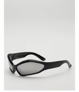 Close-up of vintage Y2K wide-frame sunglasses with silver mirrored lenses and UV protection