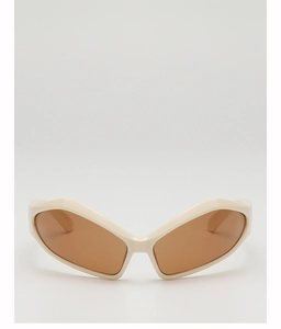 Detail of cream white cat-eye kids sunglasses with vintage amber lenses for UV protection
