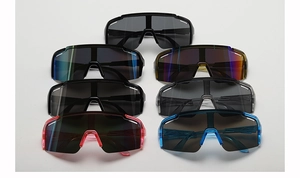 Detail view of kids sports sunglasses in various colors and wide lenses for cycling