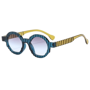 Retro round oversized sunglasses with blue wavy frame and yellow translucent temples
