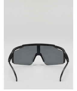 Front view of black sports cycling sunglasses with wide integrated lens for children