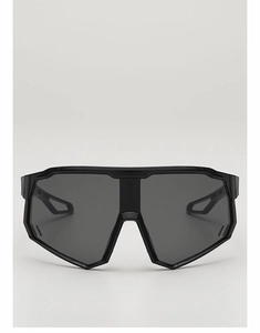 Close-up of oversized black shield frame sports sunglasses with dark grey lenses