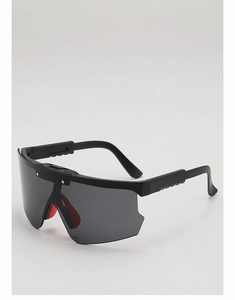 Macro detail of kids cycling goggles with black frame and contrasting red nose pads