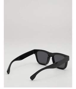 Detailed side view of glossy black square sunglasses frame showing the CY5594 model number