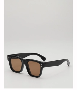 Close-up of black retro square sunglasses featuring silver star rivets and brown lenses