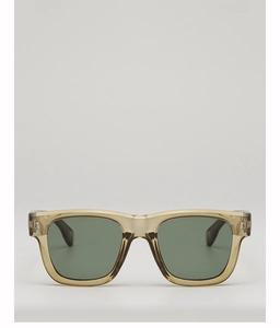 Front view detail of square translucent tea brown resin sunglasses with dark grey lenses
