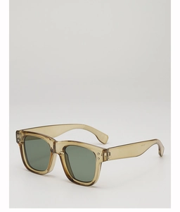 Detail view of tea brown sunglasses frames with metallic rivet accents and green lenses