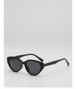 Detail of vintage cat-eye sunglasses with glossy black frame and dark grey lenses