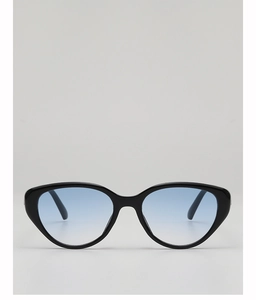 Detailed view of vintage cat eye sunglasses with black frame and blue gradient lenses