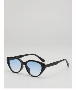 Detailed macro view of black cat-eye sunglasses with blue gradient lenses and glossy frame