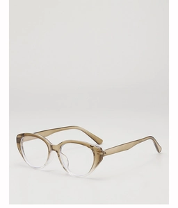 Detail of vintage cat-eye sunglasses with brown gradient frames and stylish temples
