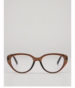 Macro view of vintage cat-eye sunglasses featuring amber tortoise resin and black frame