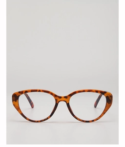 Detailed front view of vintage cat-eye sunglasses with tortoiseshell pattern and high gloss