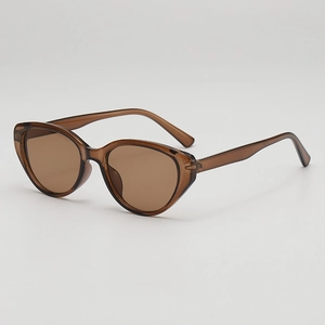 Vintage cat-eye sunglasses with translucent brown frames and dark UV protection lenses