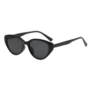 Retro black cat-eye sunglasses for women with UV protection lenses on white background