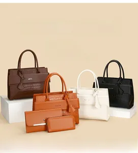 Detailed set of crocodile embossed leather handbags and wallets in assorted colors
