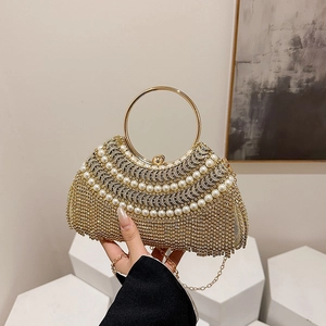 Golden evening bag with pearls, rhinestones, and metallic fringe for formal occasions
