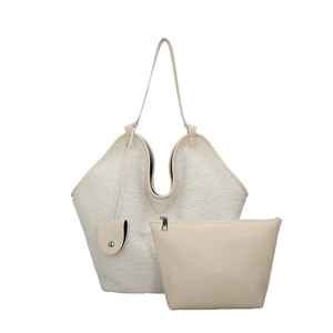 White faux shearling tote bag set with beige leather clutch and slim handles