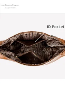 Detailed interior of the brown leather tote bag showing pockets and striped lining