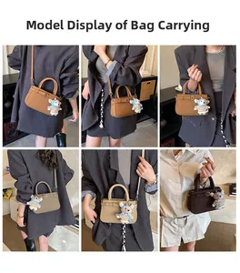 Litchi pattern leather tote bag details featuring top handle and cute bear pendant
