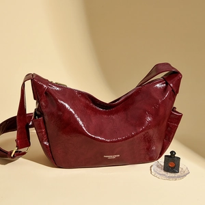 Retro burgundy wine red hobo bag in glossy leather with adjustable shoulder strap