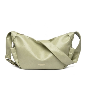 Pale green crinkled PU leather tote bag with wide shoulder strap and gold hardware