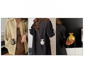 Three metallic pouch-shaped mini bags in gold, silver, and black with delicate chain straps