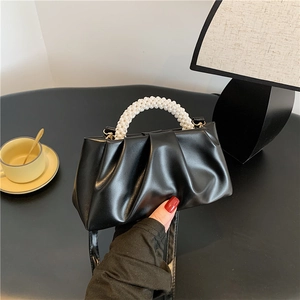 Elegant black ruched cloud handbag with pearl handle and detachable crossbody strap