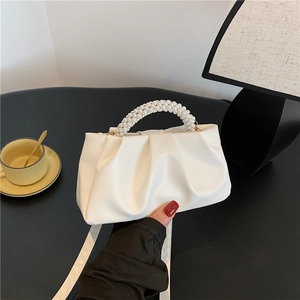 White ruched cloud handbag with pearl bead handle and adjustable shoulder strap
