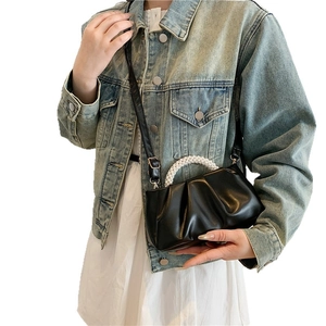 Elegant black ruched cloud handbag with pearl bead handle and slim crossbody strap