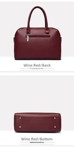 Detailed view of wine red tote bag showing rear zip pocket and protective bottom studs