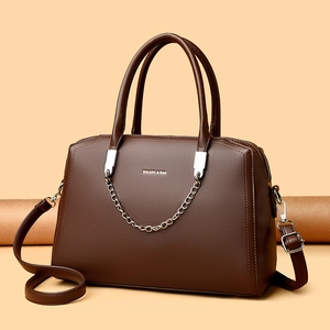 Deep brown lychee pattern tote bag with silver chain and adjustable shoulder strap