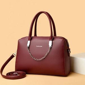 Burgundy litchi grain tote bag with silver chain strap and top handle design