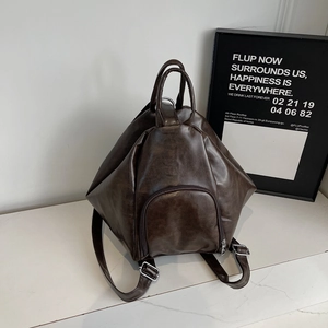 Minimalist deep brown vintage PU leather backpack with geometric design and silver hardware