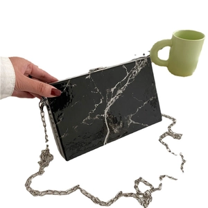 Modern square marble pattern clutch bag with silver metal clasp and chain strap