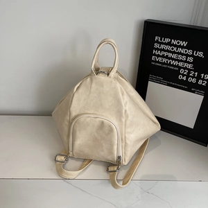 Minimalist beige geometric backpack with top handle and adjustable shoulder straps