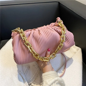 Soft pink pleated cloud bag with chunky gold chain detail, stylish women's shoulder handbag