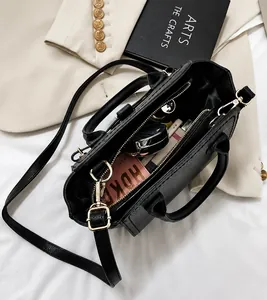 Internal view of black pebble leather tote bag showing spacious capacity for essentials