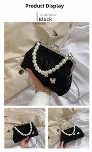 Detail of black beaded evening bag with pearl handle and metal butterfly charms
