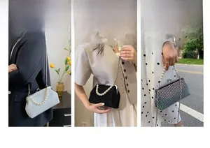 Three-way display of rhinestone shell bag with pearl handle and chain shoulder strap