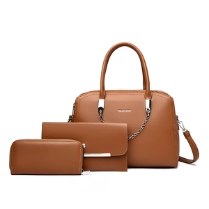 Three-piece brown faux leather handbag set with large tote, clutch, and long wallet
