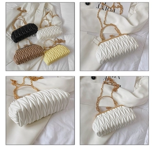 Detailed view of quilted matelassé leather textures and elegant metal chain shoulder straps