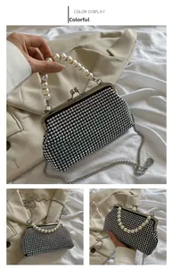 Detailed macro of a multicolor rhinestone evening bag with a pearl handle and metal chain